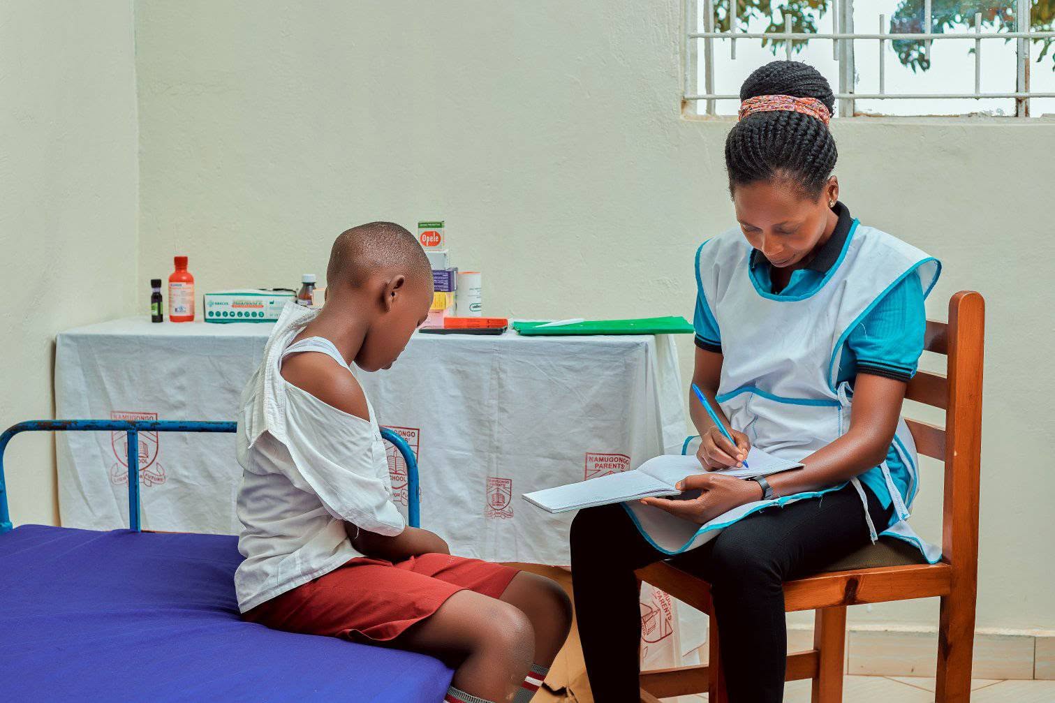 pupil with nurse in sick bay
